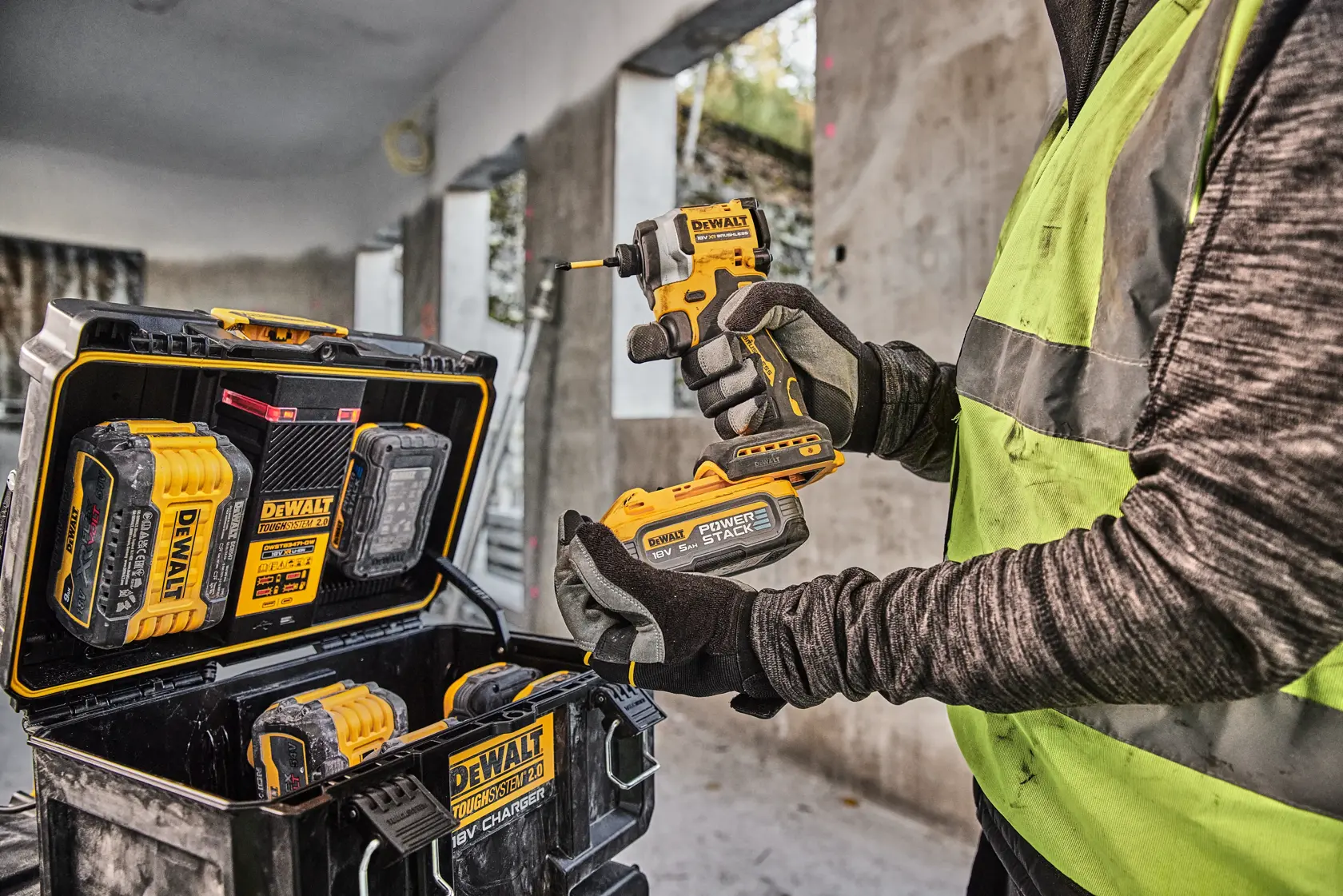 DEWALT ToughSystem 2.0 promotional graphic with the slogan 'Storage Built to Handle It' in large, bold yellow lettering on a dark, textured background.